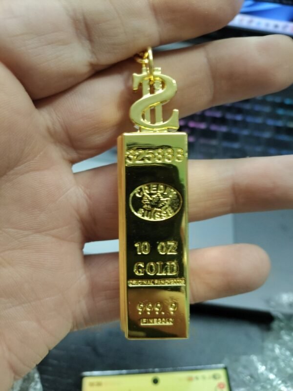 encendedor lingote de oro